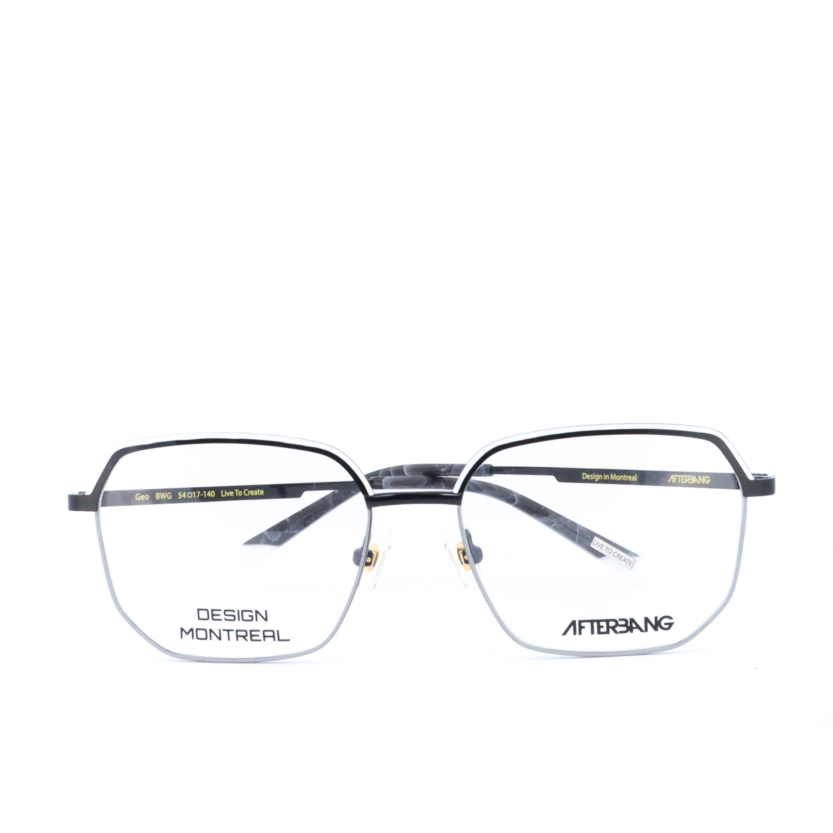 A pair of eyeglasses with a metallic frame and clear lenses, featuring the brand name 'AFTERBANG' and 'DESIGN MONTREAL' on the temples.