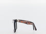 tortoiseshell frame and black lenses on a white background