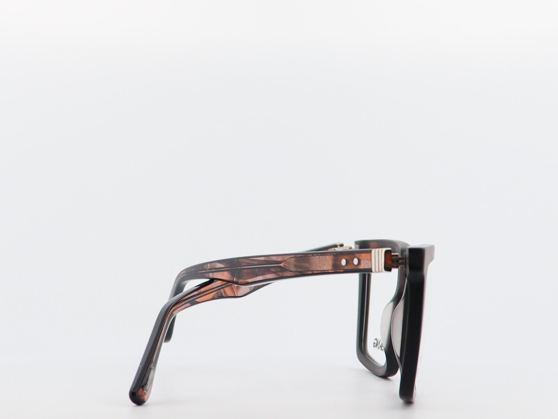 Glasses with a tortoiseshell frame on a white background