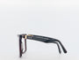 Black and gold eyeglasses on a white background