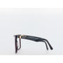 Black and gold eyeglasses on a white background