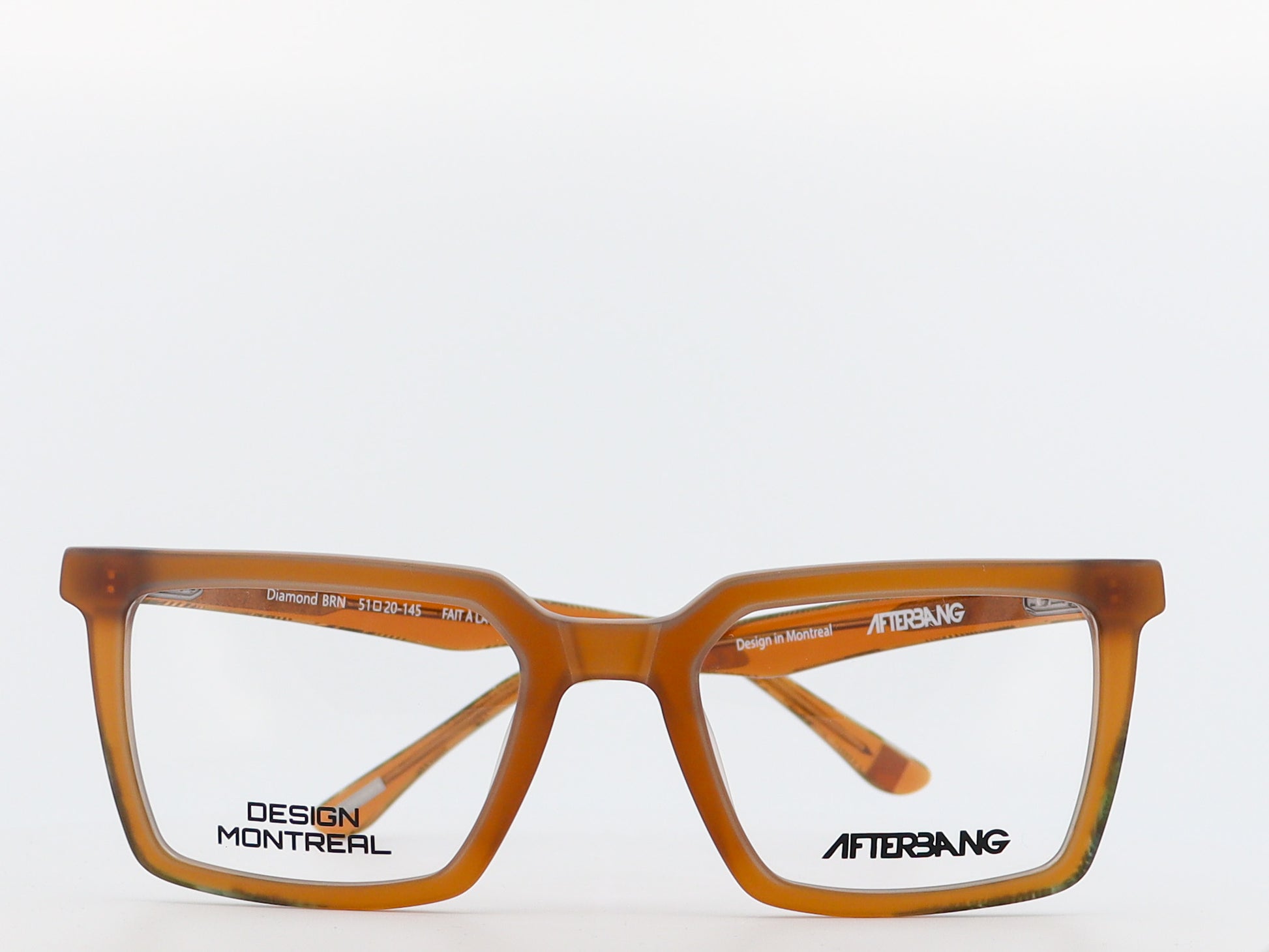 Brown eyeglasses with 'Design Montreal' and 'Afterbang' branding on a white background