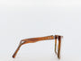 Brown eyeglasses on a white background