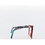 Multicolored eyeglass frame on a white background