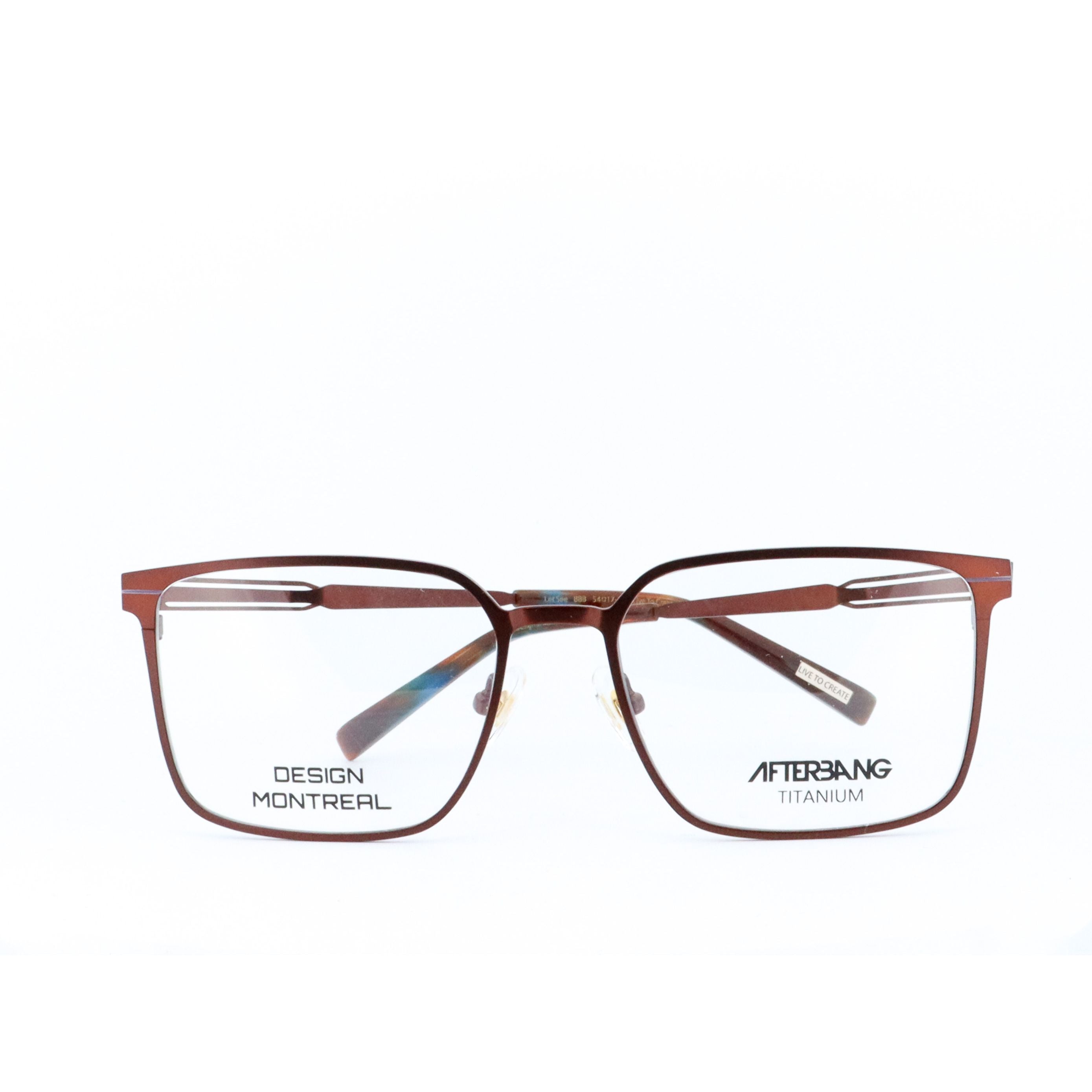 A pair of rectangular full frame eyeglasses with a brown metallic frame, displaying the brand name 'DESIGN MONTRAL' on the side.